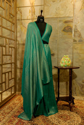 Teal Banarasi Soft Silk Saree with all over brocade pattern in matt Gold jari